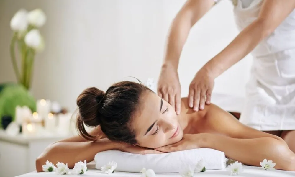 Luxury massage therapy at a Coimbatore spa hotel.
